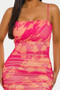 Sunset-hued bodycon dress with floral patterns.