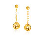 Classic gold love knots dangle from ball post earrings and fine chain. Post earrings are 28 millimeters long and are held in place by Euro clasps