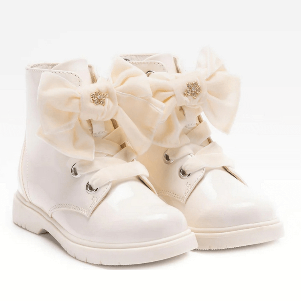 pair of cream Lelli Kelly hitop shoes
