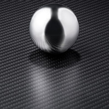 6k 2x2 Twill weave carbon fiber - with ball to display reflectiveness of satin finish