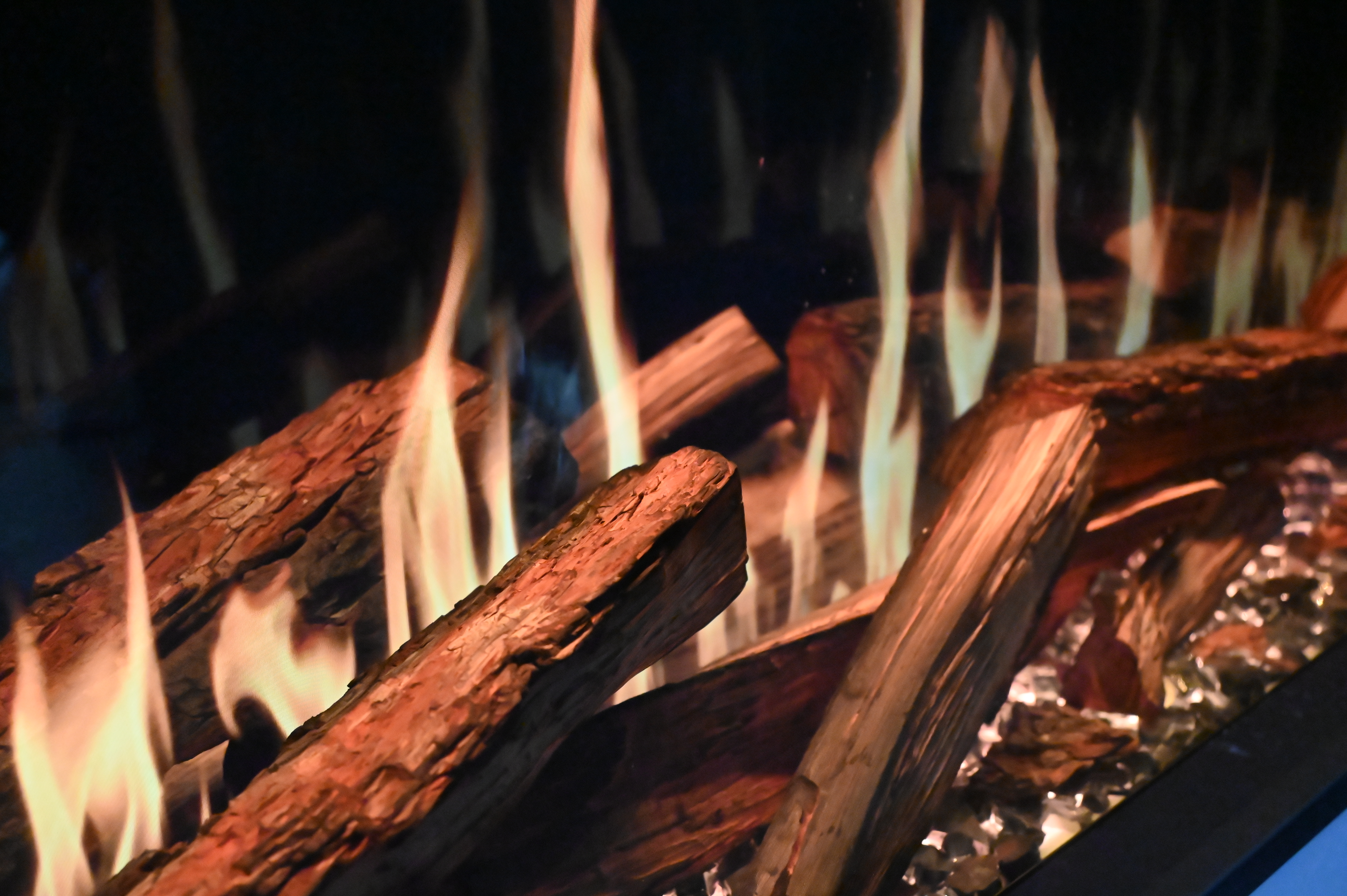 Close-up of TruWood flame and premium timber detail