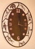 Oval Petroglyph Metal Wall Clock