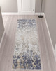 3' x 10' Tan Ivory and Blue Abstract Power Loom Distressed Runner Rug
