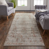3' x 10' Tan Ivory and Orange Floral Power Loom Distressed Runner Rug with Fringe