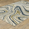3' x 5' Ivory Blue and Beige Abstract Power Loom Stain Resistant Area Rug