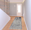 3' x 8' Tan Blue and Ivory Abstract Power Loom Distressed Runner Rug