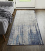 3' x 8' Tan Blue and Ivory Abstract Power Loom Distressed Runner Rug