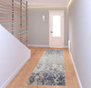 3' x 8' Tan Ivory and Blue Abstract Power Loom Distressed Runner Rug