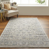 4' x 6' Ivory and Blue Abstract Power Loom Distressed Polypropylene Area Rug