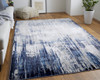 4' x 6' Tan Blue and Ivory Abstract Power Loom Distressed Area Rug