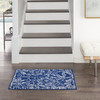 5' x 7' Navy Blue Floral Dhurrie Polypropylene Area Rug