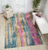 5' x 7' Pink and Blue Abstract Power Loom Area Rug