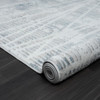 5' x 7' Blue Abstract Polypropylene Rectangle Area Rug
