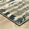 5' x 7' Blue and Beige Abstract Power Loom Stain Resistant Area Rug