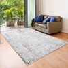 5' x 7' Gray Cream and Taupe Abstract Distressed Stain Resistant Area Rug