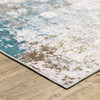 5' x 7' Ivory Teal Blue Grey Brown and Gold Abstract Printed Non Skid Area Rug