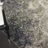 5' x 7' Gray and Ivory Abstract Power Loom Area Rug