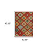 5' x 8' Red Green Gold Blue Teal and Ivory Geometric Power Loom Stain Resistant Area Rug