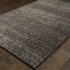 5' x 8' Charcoal Grey and Brown Geometric Power Loom Stain Resistant Area Rug