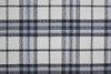 5' x 8' Ivory Blue and Black Abstract Hand Woven Stain Resistant Area Rug