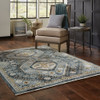 5' x 8' Blue Gold Ivory and Navy Oriental Power Loom Stain Resistant Area Rug with Fringe