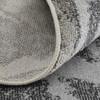 5' x 8' Gray Silver and Ivory Abstract Power Loom Area Rug