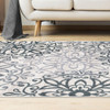 5' x 8' Oatmeal and Gray Medallion Power Loom Stain Resistant Area Rug