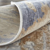 5' x 8' Tan Orange and Ivory Abstract Power Loom Distressed Area Rug
