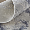 5' x 8' Ivory and Blue Abstract Power Loom Distressed Area Rug