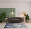 5' x 8' Ivory Blue and Black Abstract Power Loom Distressed Area Rug