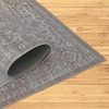 5' x 8' Beige Oriental Power Loom Distressed Stain Resistant Area Rug