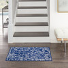6' x 9' Navy Blue Floral Dhurrie Polypropylene Area Rug