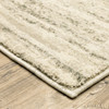 6' x 9' Beige and Grey Abstract Power Loom Stain Resistant Area Rug