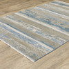 6' x 9' Ivory Beige Grey Blue and Tan Abstract Power Loom Area Rug with Fringe