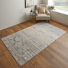 7' x 10' Blue and Ivory Power Loom Distressed Area Rug