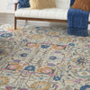 7' x 10' Orange and Ivory Floral Power Loom Area Rug