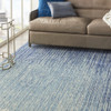 7' x 10' Ivory & Blue Abstract Power Loom Area Rug