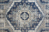 7' x 10' Blue and Ivory Abstract Power Loom Distressed Stain Resistant Area Rug