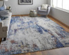 7' x 10' Ivory and Blue Abstract Power Loom Distressed Stain Resistant Area Rug