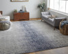 7' x 10' Ivory and Blue Abstract Power Loom Area Rug