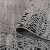 7' x 10' Brown Geometric Polypropylene Area Rug