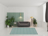 7' x 10' Aqua Geometric Flat Weave Polypropylene Area Rug