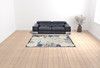 7' x 10' Blue and Grey Floral Stain Resistant Polypropylene Area Rug