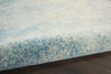 7' x 10' Ivory & Blue Abstract Power Loom Polypropylene Area Rug
