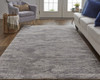 7' x 9' Tan Taupe and Gray Abstract Power Loom Distressed Stain Resistant Area Rug