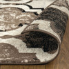7' x 9' Ivory Quatrefoil Power Loom Distressed Stain Resistant Area Rug