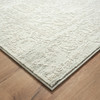 8' x 10' Ivory and Gray Floral Power Loom Distressed Stain Resistant Area Rug