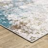 8' x 10' Ivory Teal Blue Grey Brown and Gold Abstract Printed Non Skid Area Rug