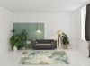 8' x 10' Blue Green Grey and Ivory Abstract Power Loom Stain Resistant Area Rug