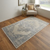 8' x 10' Blue and Ivory Floral Power Loom Distressed Area Rug